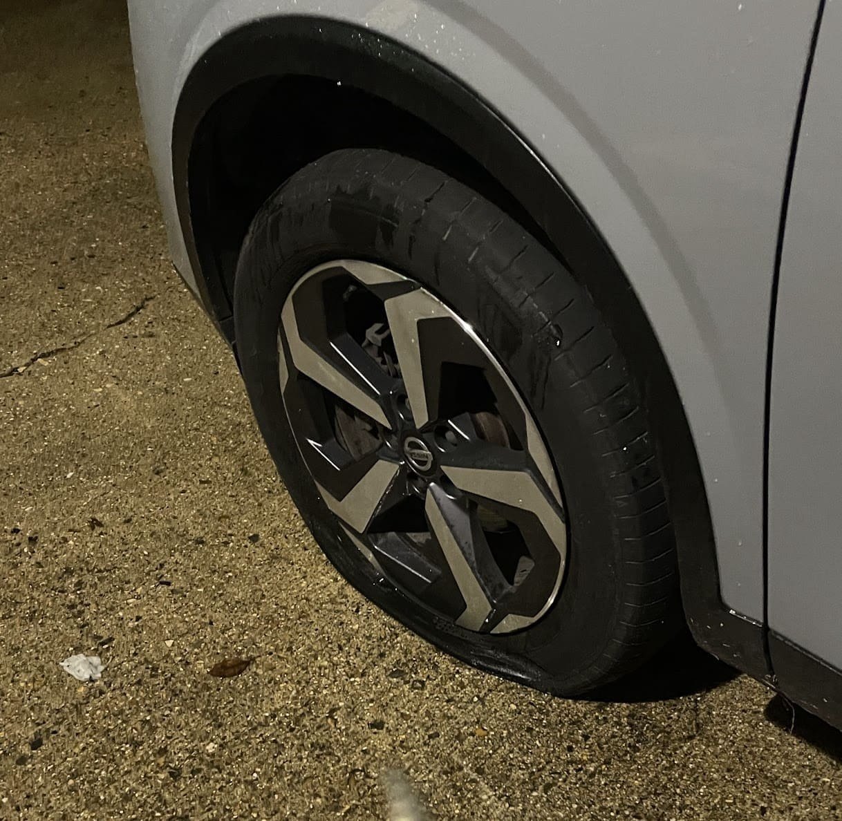 Close‑up of professional puncture repair on tyre tread