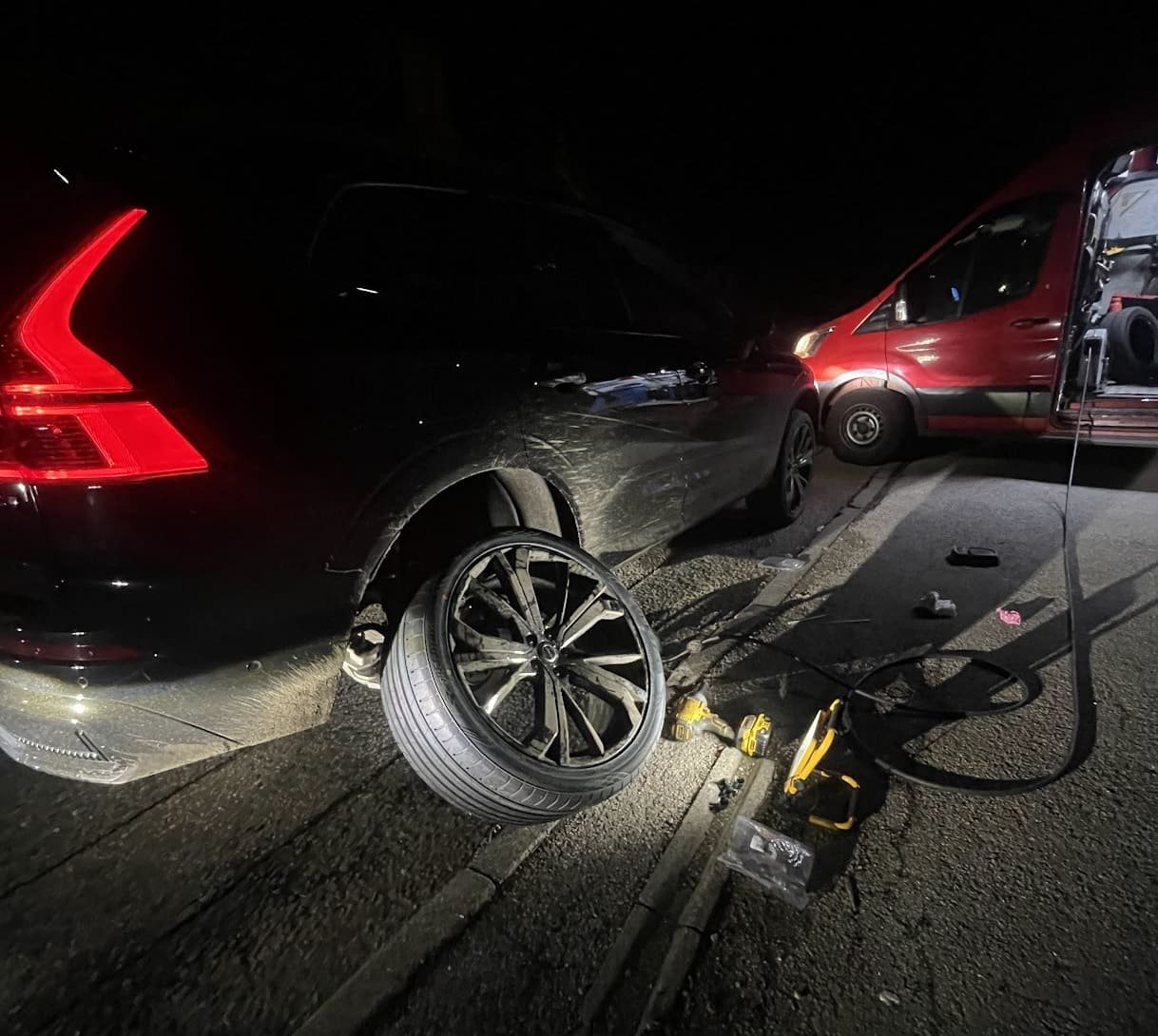 Branded mobile tyre van on the hard shoulder with hazard lights